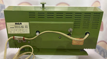 Sage Green 1969 RCA AM/FM with Bluetooth/Aux input.
